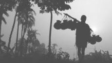 কনকনে শীতে কাঁপছে উত্তরের জনপদ