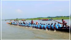 মাদারীপুরে আড়িয়াল খাঁ নদীতে নৌকা বাইচের জমজমাট আয়োজন